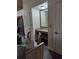 Convenient vanity area with a mirror and granite countertop at 12521 Floridays Resort Dr # 207F, Orlando, FL 32821