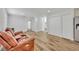 Spacious living area with wood floors, plentiful storage, and natural light at 1445 Creekside Cir, Winter Springs, FL 32708