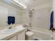 Clean bathroom with tub shower, vanity, and mirror at 250 Silas Phelps Ct, Orlando, FL 32828
