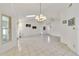 Bright dining room featuring tile floors and a chandelier at 250 Silas Phelps Ct, Orlando, FL 32828