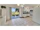 Kitchen with white cabinets and view of backyard at 250 Silas Phelps Ct, Orlando, FL 32828