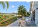 Patio with table and chairs overlooking yard at 250 Silas Phelps Ct, Orlando, FL 32828