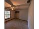 Simple bedroom with window, closet and hardwood floors at 2663 Magnolia Rd, Deland, FL 32720
