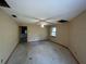 Bright bedroom featuring a window and ceiling fan at 2663 Magnolia Rd, Deland, FL 32720