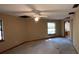 Well-lit bedroom with two windows and ceiling fan at 2663 Magnolia Rd, Deland, FL 32720