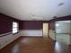 Spacious dining room with hardwood floors and access to other rooms at 2663 Magnolia Rd, Deland, FL 32720
