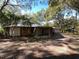 Side view of the house, highlighting the screened porch at 2663 Magnolia Rd, Deland, FL 32720