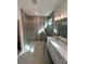 Spa-like bathroom with walk-in shower and double vanity at 4934 Shady Pines Dr, Saint Cloud, FL 34772
