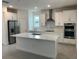 Modern kitchen with stainless steel appliances and large island at 4934 Shady Pines Dr, Saint Cloud, FL 34772