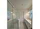 Spa-like bathroom with large shower and double vanity at 5031 Dancy Ln, Saint Cloud, FL 34772