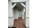 Inviting front entry with light paint and brick pavers at 5031 Dancy Ln, Saint Cloud, FL 34772