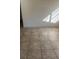 Bright living room with tile flooring and neutral walls at 5465 Lescot Ln, Orlando, FL 32811