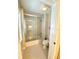 Cozy bathroom with tub/shower, toilet and vanity, complete with neutral walls and a bright shower at 7652 Whisper Way # 104, Reunion, FL 34747