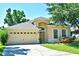 Charming single-Gathering home featuring a spacious two-car garage and a well-maintained lawn at 77 Spring Glen Dr, Debary, FL 32713