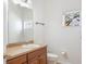 Simple bathroom with single vanity and window at 1728 Travertine Ter, Sanford, FL 32771