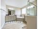 Main bathroom with soaking tub and walk-in shower at 2506 Volunteer Ave, Kissimmee, FL 34744