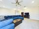 Loft with sectional sofa and entertainment center at 2506 Volunteer Ave, Kissimmee, FL 34744