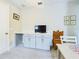 Upstairs study with built-in desk and cabinets at 2506 Volunteer Ave, Kissimmee, FL 34744