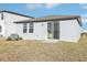 Single story home with backyard and sliding glass door at 2522 Linda Knoll Ln, Bartow, FL 33830