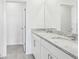 Bathroom boasts double vanity with granite countertop at 2522 Linda Knoll Ln, Bartow, FL 33830
