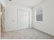 Spacious bedroom with gray carpeting and double door closet at 2522 Linda Knoll Ln, Bartow, FL 33830