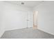 Simple bedroom with gray carpeting at 2522 Linda Knoll Ln, Bartow, FL 33830