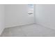 Bright bedroom with gray carpeting and window at 2522 Linda Knoll Ln, Bartow, FL 33830