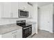 Modern kitchen with stainless steel appliances and granite countertops at 2522 Linda Knoll Ln, Bartow, FL 33830