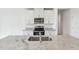 Modern kitchen with stainless steel appliances and granite countertops at 2522 Linda Knoll Ln, Bartow, FL 33830