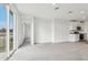 Bright living room with sliding glass doors and tile floors at 2522 Linda Knoll Ln, Bartow, FL 33830