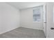 This carpeted bedroom with neutral walls and a window offers versatility and comfort at 2526 Linda Knoll Ln, Bartow, FL 33830