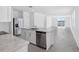 Modern kitchen featuring stainless steel appliances and a granite countertop island with an undermount sink at 2526 Linda Knoll Ln, Bartow, FL 33830