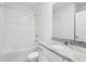 Clean bathroom with white tile and granite countertop at 2534 Linda Knoll Ln, Bartow, FL 33830
