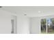 Spacious bedroom with sliding glass doors and backyard view at 2534 Linda Knoll Ln, Bartow, FL 33830