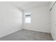 Bright bedroom with grey carpet and neutral walls at 2534 Linda Knoll Ln, Bartow, FL 33830