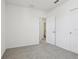 Bright bedroom with grey carpet and access to bathroom at 2534 Linda Knoll Ln, Bartow, FL 33830