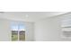 Bright bedroom with sliding glass doors leading to the backyard at 2534 Linda Knoll Ln, Bartow, FL 33830