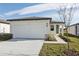 New single-story home with attached garage and landscaped yard at 2534 Linda Knoll Ln, Bartow, FL 33830