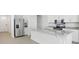 Modern kitchen with stainless steel appliances and granite countertops at 2534 Linda Knoll Ln, Bartow, FL 33830