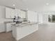Modern kitchen with stainless steel appliances and granite countertops at 2534 Linda Knoll Ln, Bartow, FL 33830