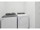 Bright laundry room with Whirlpool washer and dryer at 2534 Linda Knoll Ln, Bartow, FL 33830