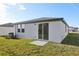 House exterior with sliding glass door and small backyard at 2538 Linda Knoll Ln, Bartow, FL 33830