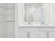 Clean bathroom with double vanity and mirrored medicine cabinet at 2538 Linda Knoll Ln, Bartow, FL 33830