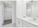 Modern bathroom with double vanity and walk-in closet at 2538 Linda Knoll Ln, Bartow, FL 33830
