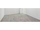 Empty bedroom showcasing grey carpet and neutral walls at 2538 Linda Knoll Ln, Bartow, FL 33830