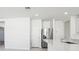 Kitchen with white cabinetry, stainless steel appliances, and quartz countertops at 2538 Linda Knoll Ln, Bartow, FL 33830