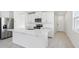 Bright and airy kitchen with white cabinets and stainless steel appliances at 2538 Linda Knoll Ln, Bartow, FL 33830