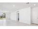 Spacious living room with tile floors and access to other rooms at 2538 Linda Knoll Ln, Bartow, FL 33830