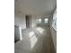 Bright and airy bonus room with carpeted floors and large windows at 4946 Shady Pines Dr, Saint Cloud, FL 34772