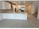 Modern kitchen with stainless steel appliances and an island at 4946 Shady Pines Dr, Saint Cloud, FL 34772
